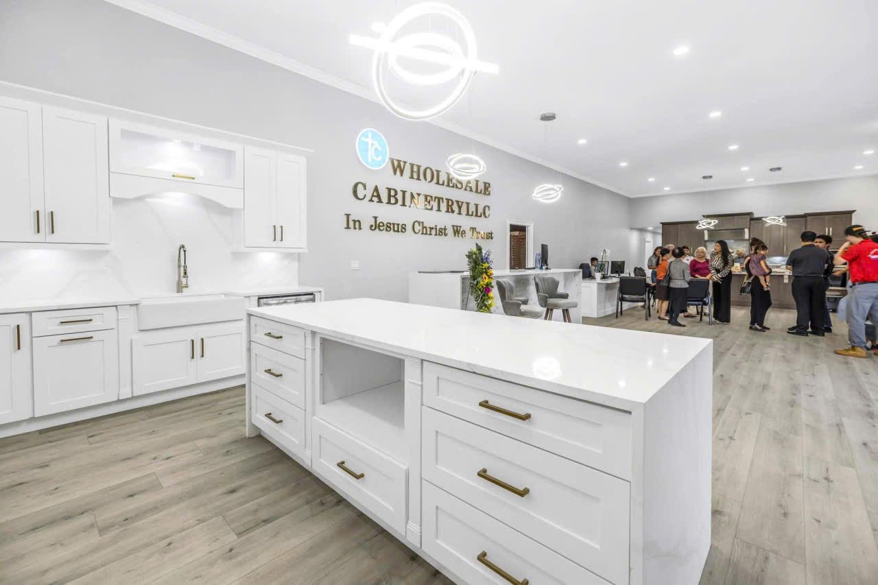 TC showroom with branded signage and finished kitchens