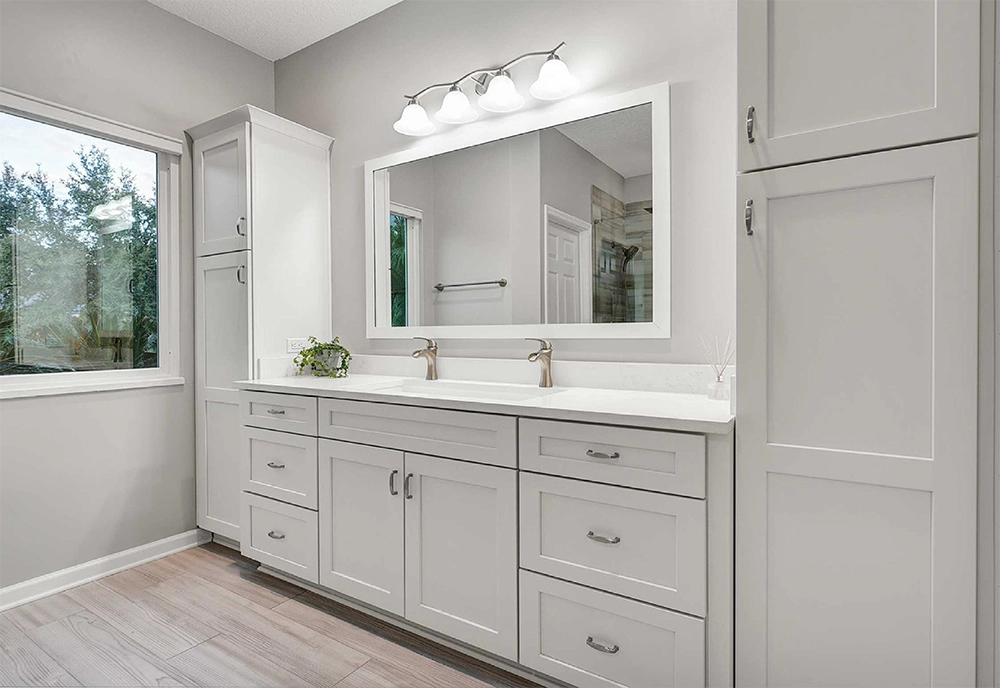 White Shaker vanity in a finished bathroom