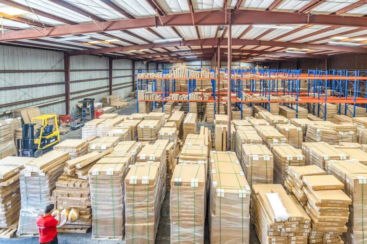 TC US distribution warehouse, stocked with flat-pack cabinets